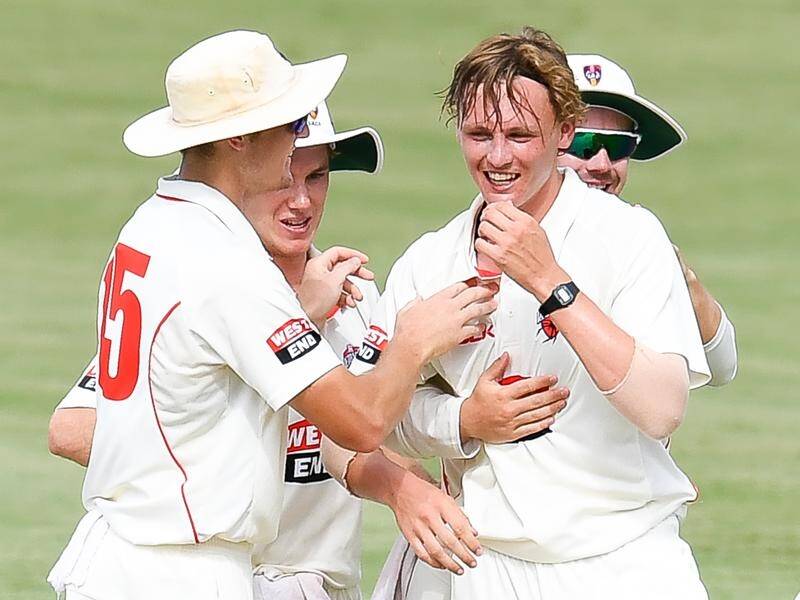 Paceman David Grant (r) took four second-innings as SA fell just shy of a Shield victory in WA.