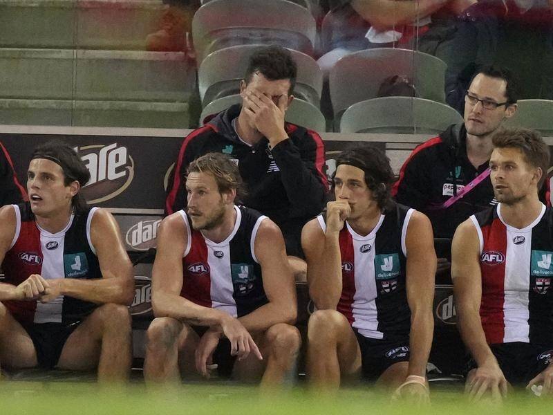 Rowan Marshall was a dejected figure on St Kilda's bench after being injured in the loss to Geelong.