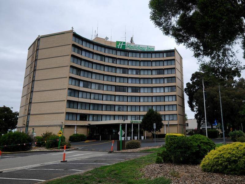 Staff at Melbourne Airport's Holiday Inn must isolate at home and all guests have been moved.