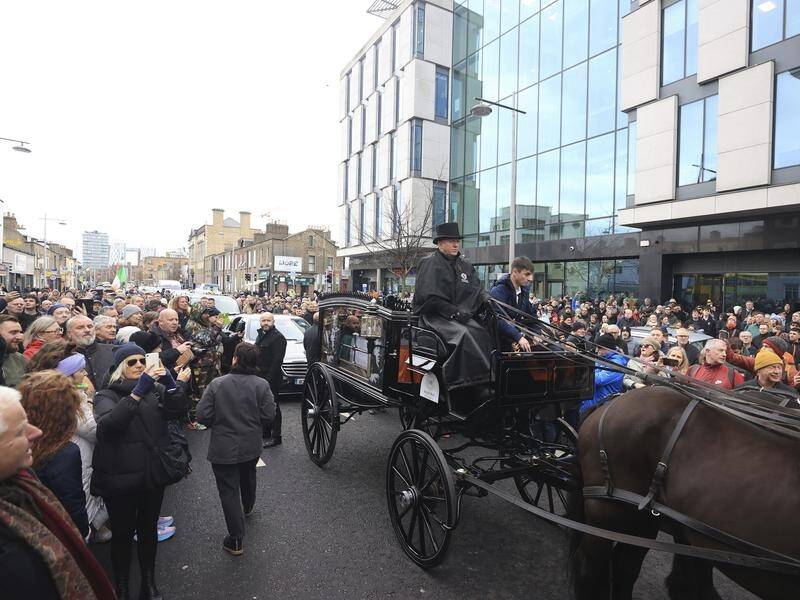 A funeral procession for Shane MacGowan made its way through the streets of Dublin. (AP PHOTO)