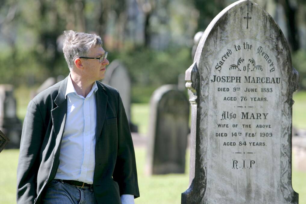 POLITICAL REBEL: Historian Tony Moore pictured at the  ‘‘forgotten’’ grave of French Canadian convict Joseph Marceau at West Dapto in 2008. Picture:  Greg Totman        