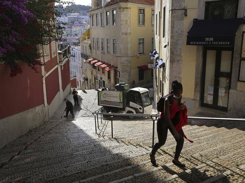 Residents in some parts of Lisbon will only be allowed out to buy essential goods and for work.