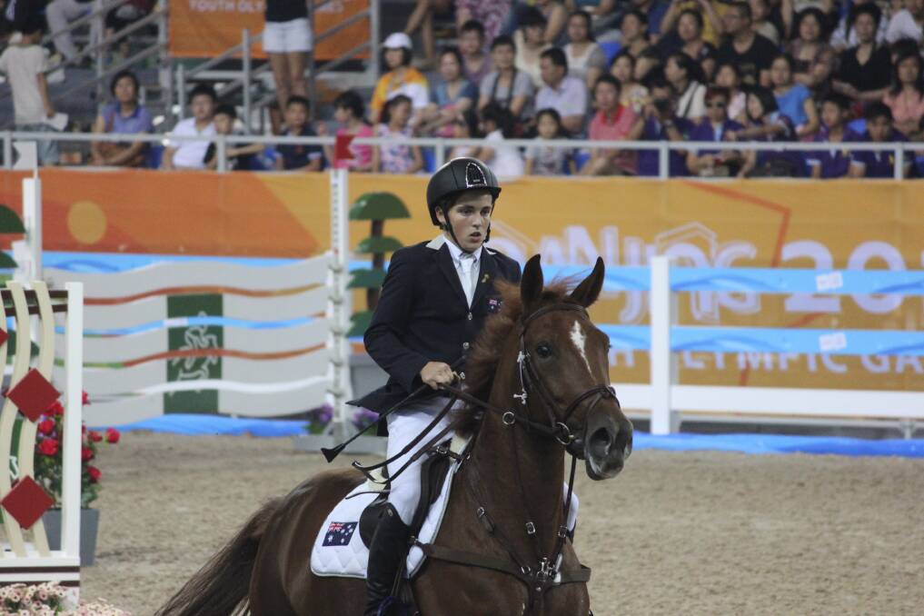 RIDE ON: Jake Hunter riding For the Star on his way to bronze at the 2014 Youth Olympic Games in Nanjing, China. Picture: Olympics.com.au