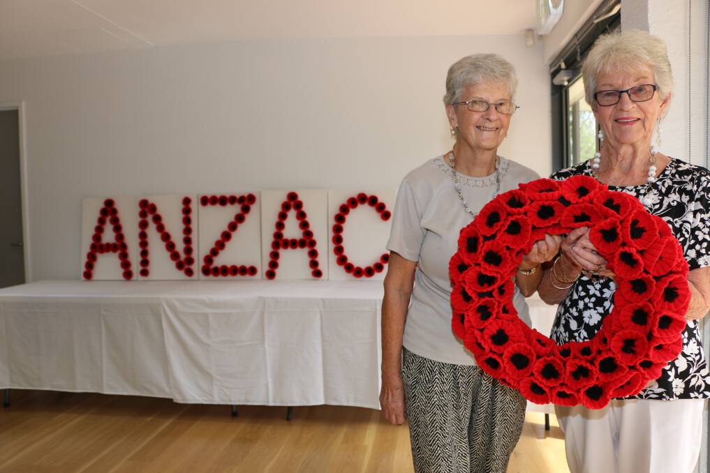 DEDICATED: Babz Albiez and Jean Hatcher, with a sample of the knitted poppies. Picture: Jamieson Murphy