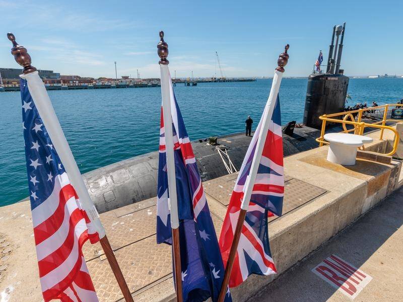 Criticism is growing over the AUKUS deal to provide eight nuclear-powered submarines for Australia. (Richard Wainwright/AAP PHOTOS)