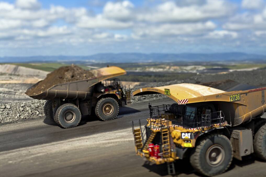 Coal festival - Mining trucks at Glencore?s Mount Owen complex between Muswellbrook and Singleton.10 Thiess Mt Owen extension.