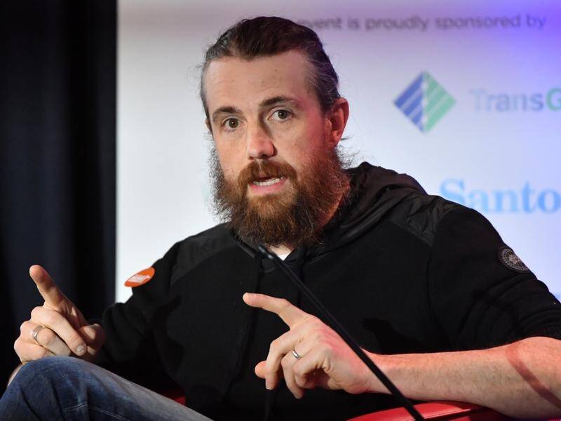 Tech boss Mike Cannon-Brookes says Australia is defending the fossil fuel industry.