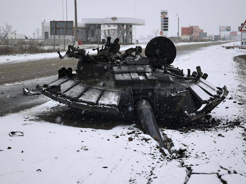 A burned-out Russian tank lies abandoned near the city of Kharkiv as the bombardment goes on.