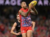 Lance Franklin of the Swans takes a mark during the victory against Richmond Tigers at the SCG.