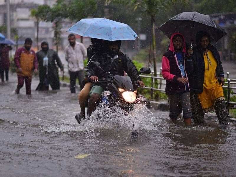 Heavy rains as Cyclone Michaug reaches southern India have led to the deaths of nine people. (EPA PHOTO)