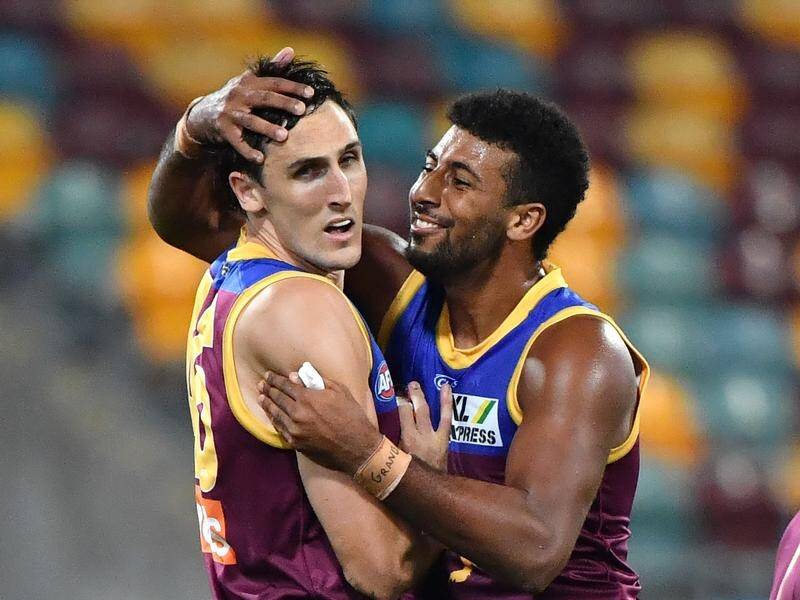 With the likes of Archie Smith (r) out, Connor Ballenden is expected to play for the Lions v Bombers
