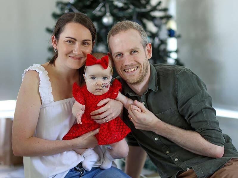 Hannah and Simon Cox with their daughter Elsie, who has survived rare birth complications. (PR HANDOUT IMAGE PHOTO)