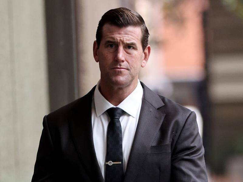 Ben Roberts-Smith dropped an Afghan prisoner onto the ground before executing him, a witness says.