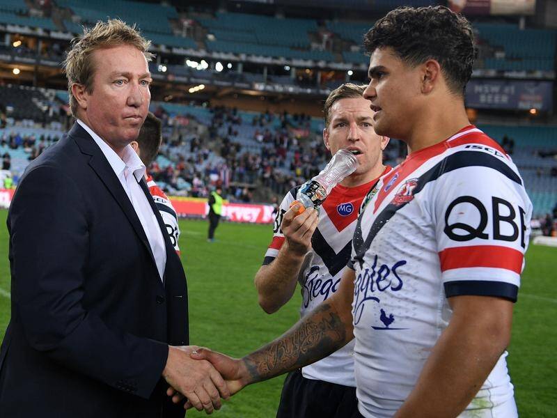 It's not lost: Trent Robinson shakes hands with Latrell Mitchell following another win back in 2018.