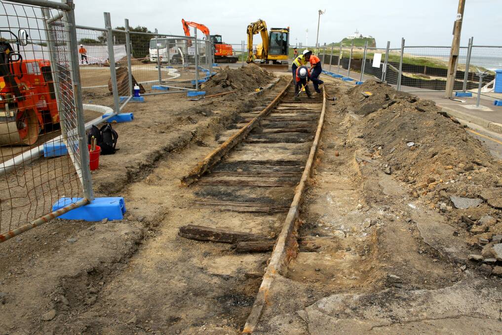 Old train tracks uncovered at Nobbys Beach, Newcastle. PIC JONATHAN CARROLL
