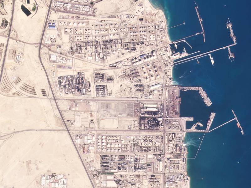 The Kuwait National Petroleum Company says a fire at the Mina al-Ahmadi oil refinery has killed two.