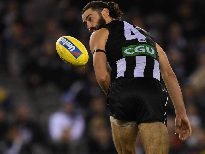 Magpie Brodie Grundy will need eyes behind him with the Giants employing a two-man team to tag him.