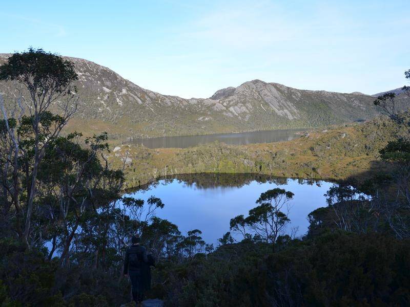 Two adults and a baby have been rescued from extremely cold weather at Tasmania's Cradle Mountain.