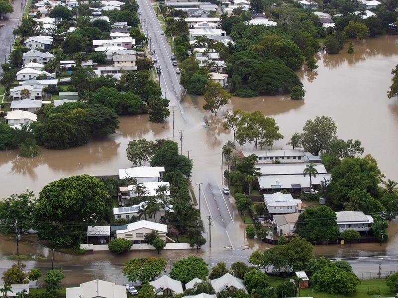 Between 400 and 500 homes have been swamped by floodwaters in Townsville.