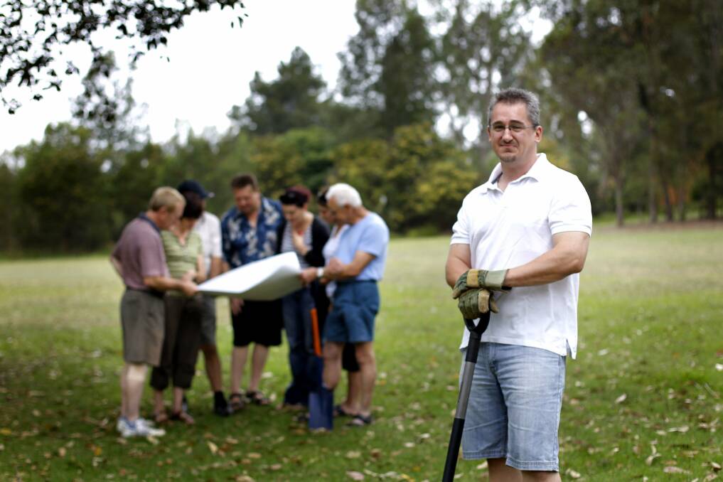 PROGRESS: Warners Bay Community Garden Group convener Steve Taylor with some of the members at Bunya Park.