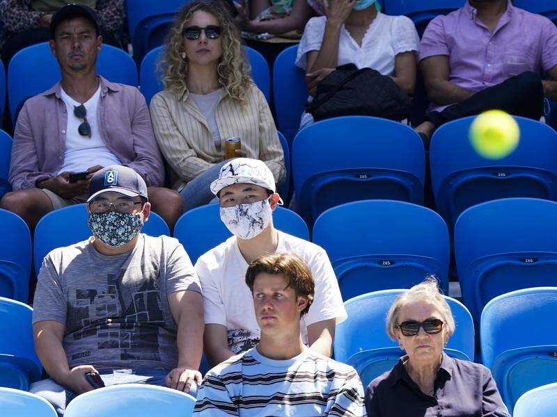 The Australian Open will proceed without crowds and players will go into a "bubble".