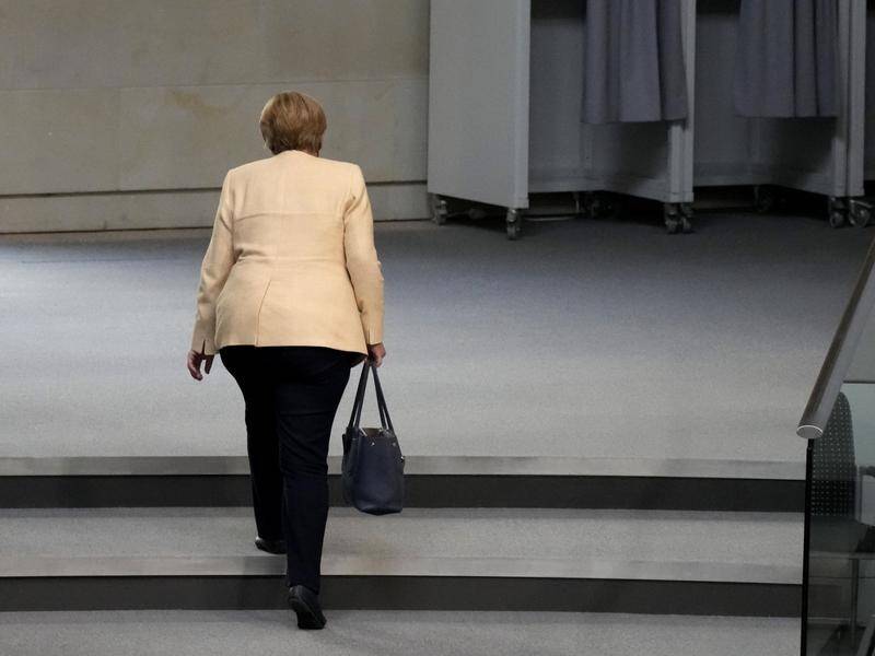 It is likely to be some months before Germans see the back of long-term leader Angela Merkel.