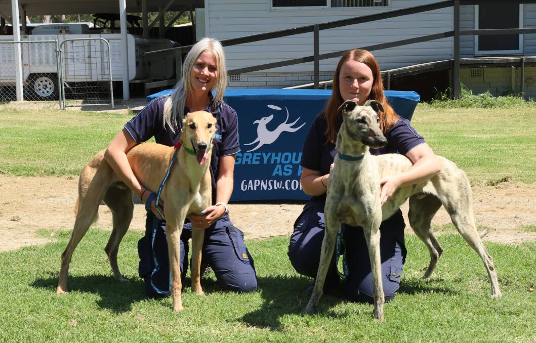PURPOSE-BUILT: GAP NSW staff Rachel McGarry with Quill (left) and Hayley Weston with Mario (right) at the organisation's new Western Sydney Facility at Richmond. Picture: SUPPLIED. 