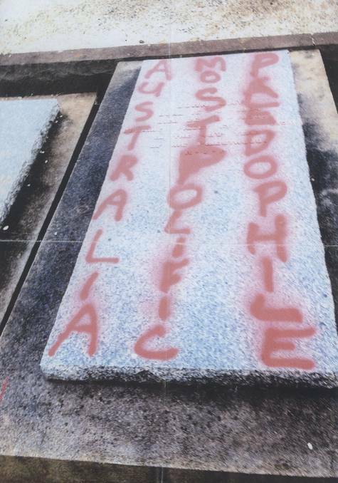Grave of disgraced paedophile priest spay-painted in graffiti attack.