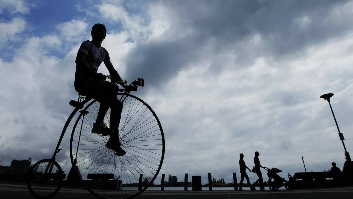 Jonah Kennedy of New Lambton display riding a penny farthing bicycle at the waterfront at the launch of the ORICA Newcastle Cycle Classic, at the Crowne Plaza in Honeysuckle on Tuesday. Picture: Max Mason-Hubers
