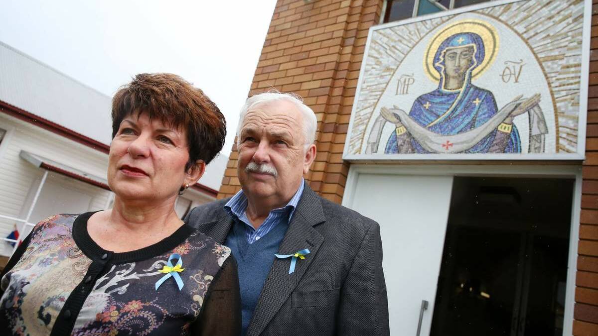 REMEMBERED: Dr Olga Ostrowskyj and husband Dr Wolodymyr Mojyka, of Valentine, read out names of those killed in Kiev. Picture: Dean Osland