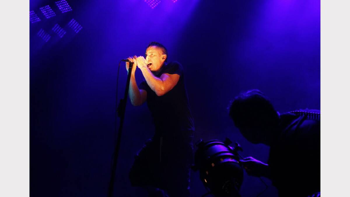 Trent Reznor, lead singer of  Nine Inch Nails, on stage at the Newcastle Entertainment Centre. NIN played with Queens of the Stone Age. Picture Max Mason-Hubers