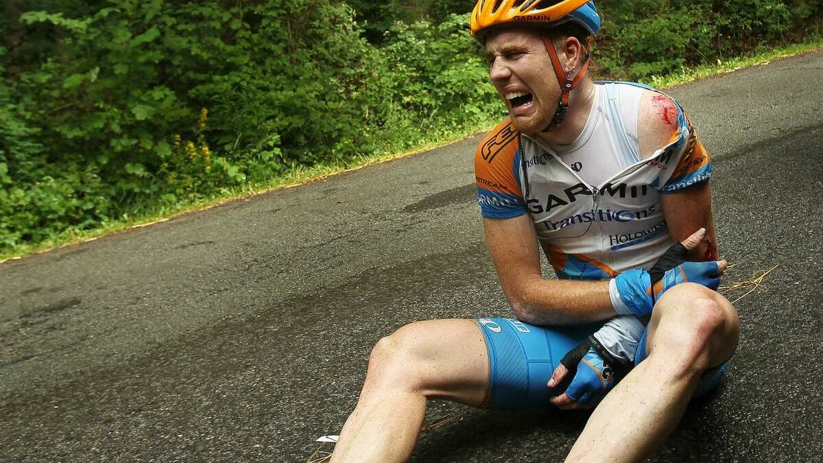 OW: Roundabouts, driveways and the placements of road lines are major danger zones for bike commuters.  Tyler Farrer falls in the 2010 Tour de France. Picture Getty