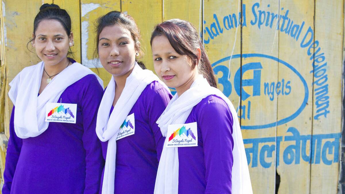 VIGILANCE: 3 Angels Nepal ambassadors try to help the girls.  Picture: Melissa Histon