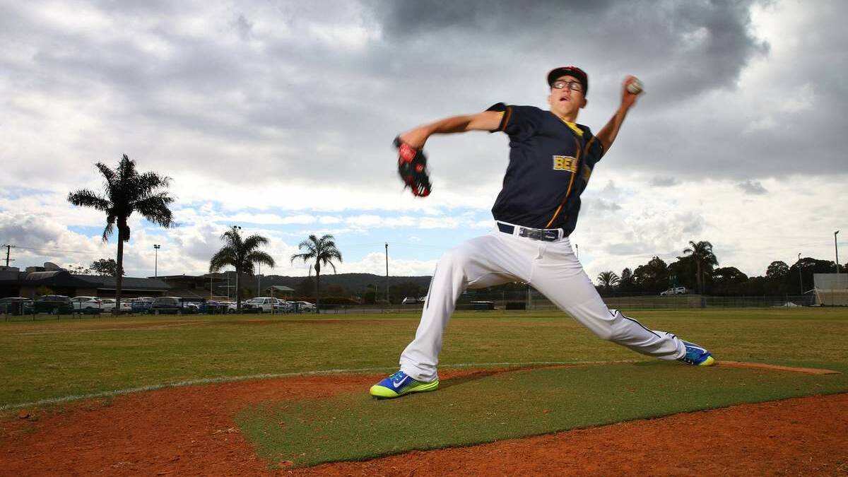 STRIKING IT LUCKY: Belmont teenager Lachlan Wells on the mound at Les Miller Field yesterday after signing a deal with the Minnesota Twins.  Picture: Dean Osland