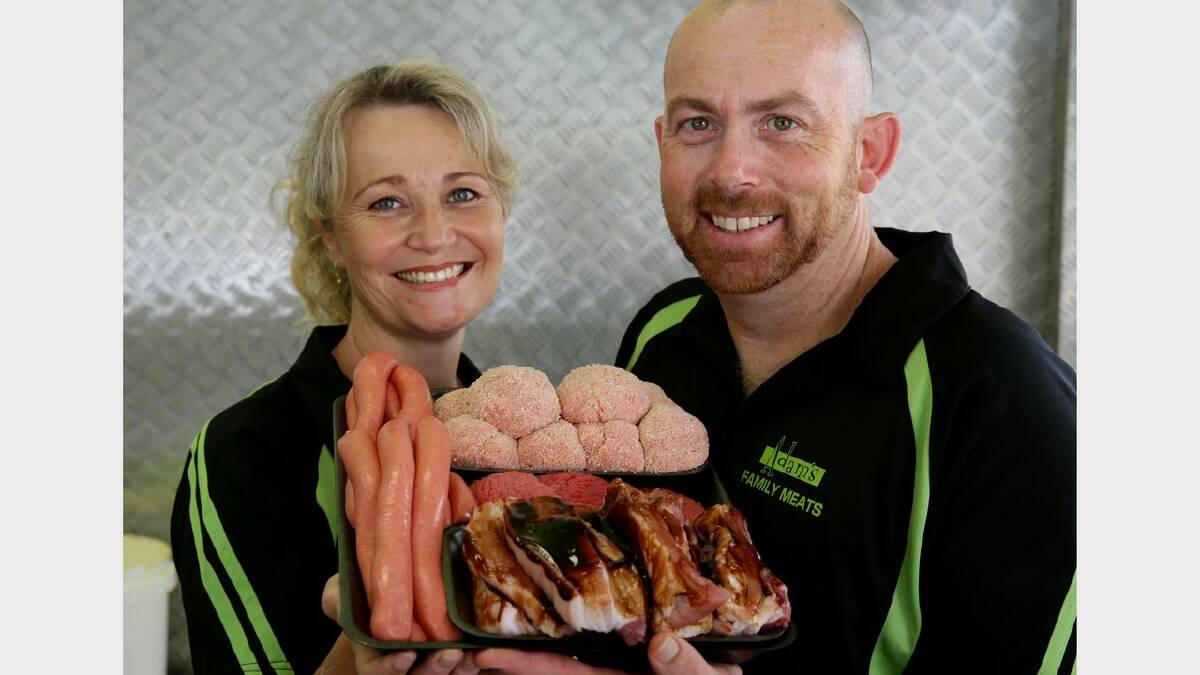 ALL SET: Adam’s Family Meat’s owner Adam Grogan  and his fiance, Tania, with an Australia Day Meat Pack. Picture: Peter Stoop