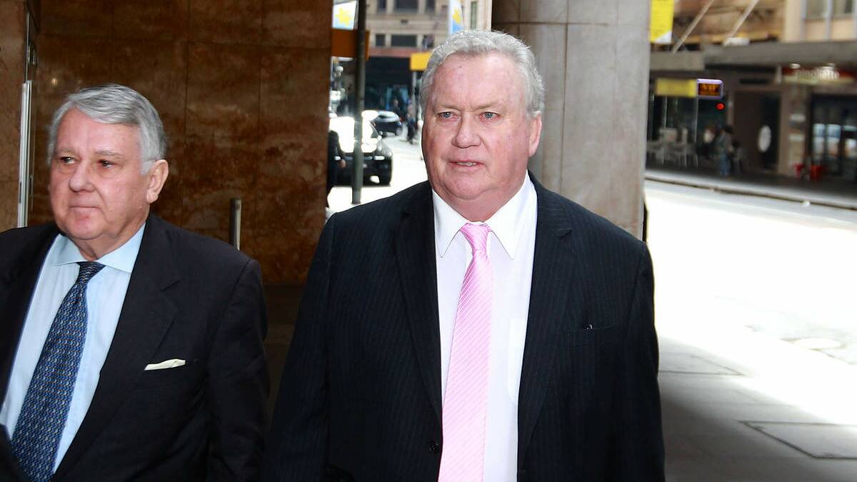 EVIDENCE:  Newcastle lord mayor Jeff McCloy,  right, arrives at ICAC on Thursday. Picture:  Ben Rushton