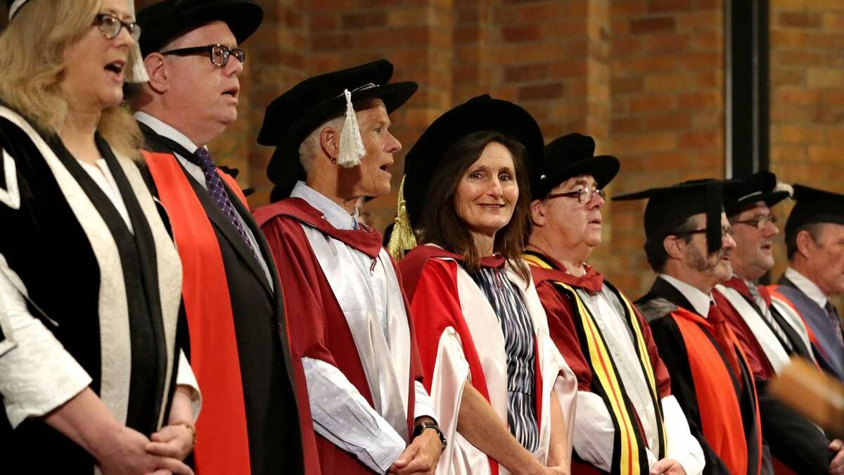 Newcastle Herald journalist Joanne McCarthy received an honorary doctorate – and a standing ovation – at the University of Newcastle’s graduation ceremony yesterday.  Picture: Simone De Pea