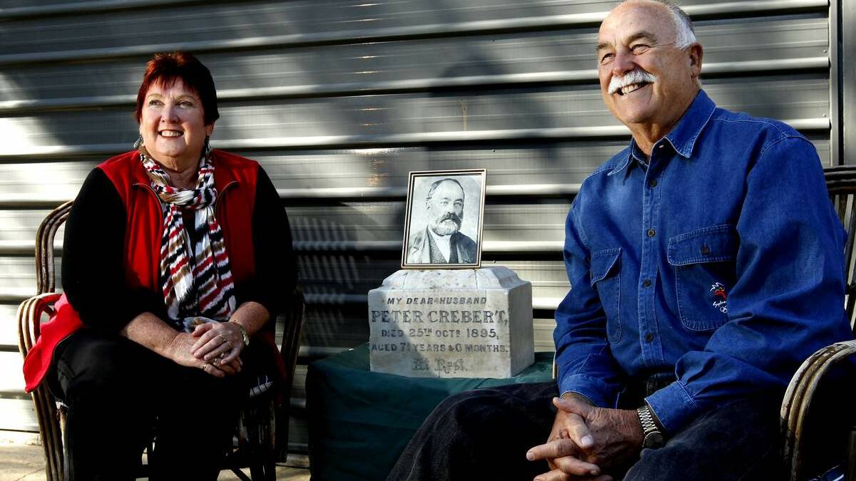 AMAZING FIND: Jan and Ron Crebert pictured with part of the missing Mayfield tombstone of family patriarch and pioneer vigneron, Peter Crebert.   Picture: Simone De Peak