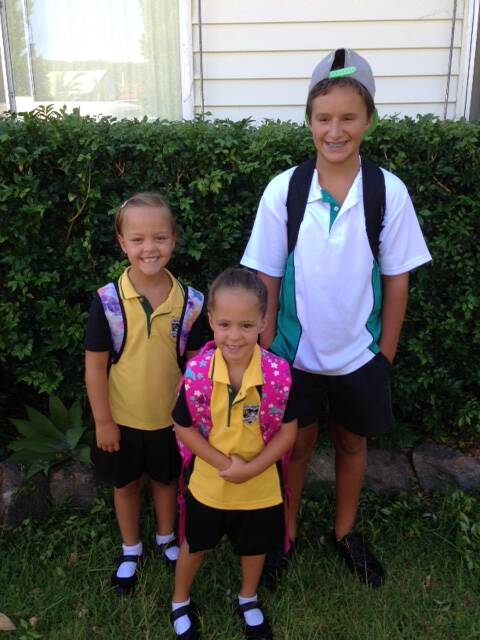 Keeley and Lydia (first day in Kindy) from Caves Beach Primary, with big brother Tywyn from Swansea High School.