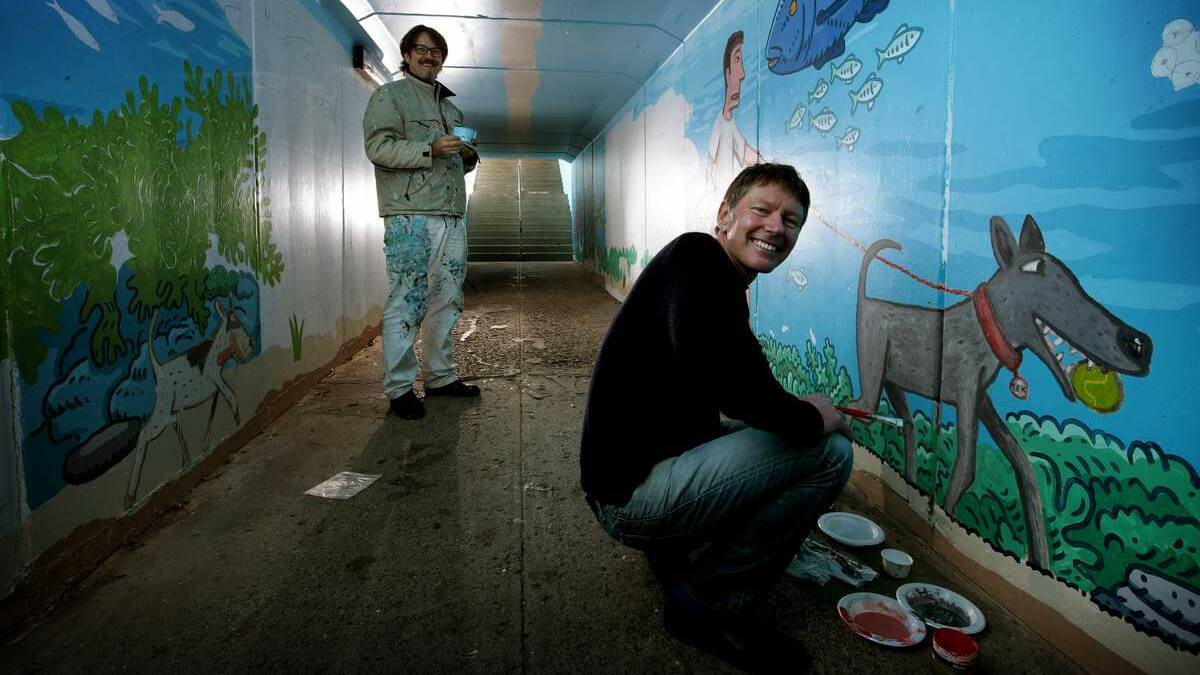 SCENERY: Artists Trevor Dickinson, left, and Michael Bell  in the Merewether tunnel. Picture: Peter Stoop