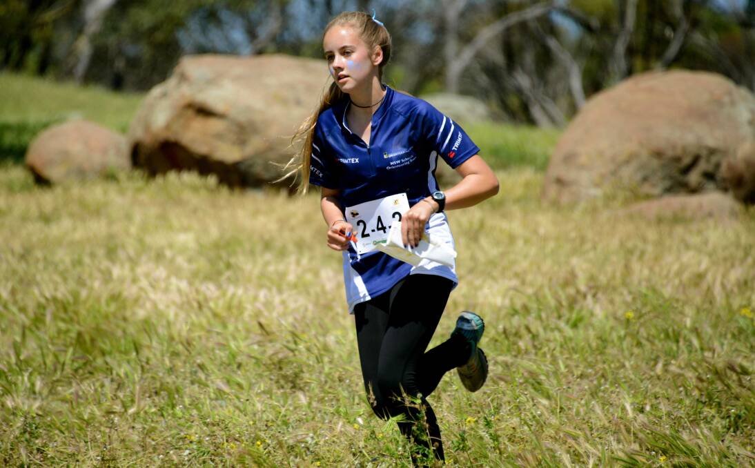 Cooks Hill orienteer Claire Burgess competing in the 2014 Australian Schools Orienteering Championships in Western Australia. Picture: Tony Hill