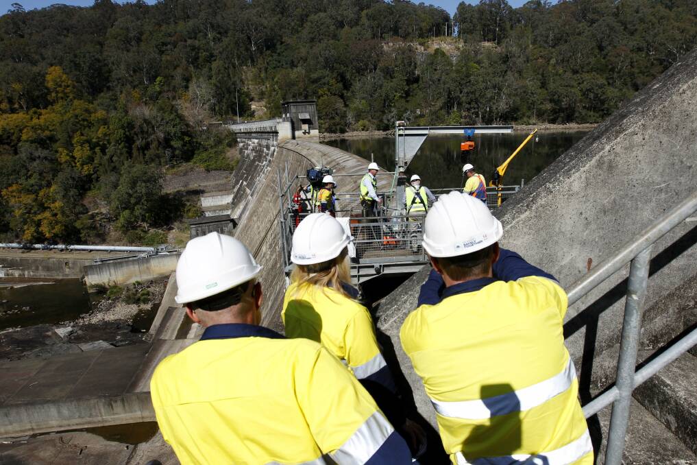 Government officials and specialists began work on surveying Chichester Dam on Thursday. Pictures by Darren Pateman
