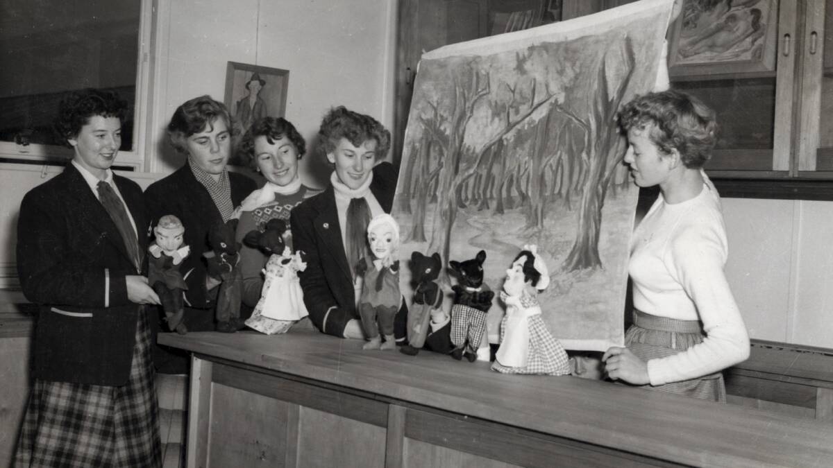 Teachers College students preparing for a puppet show, 1954. 