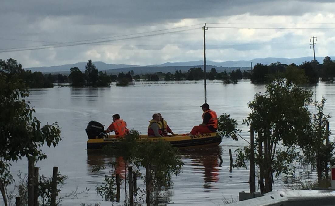 An SES boat to Gillieston Heights. Picture: Ian Kirkwood
