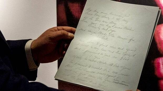 The original manuscript for singer Don McLean's "American Pie" at Christie's auction house in New York. Picture: Reuters

