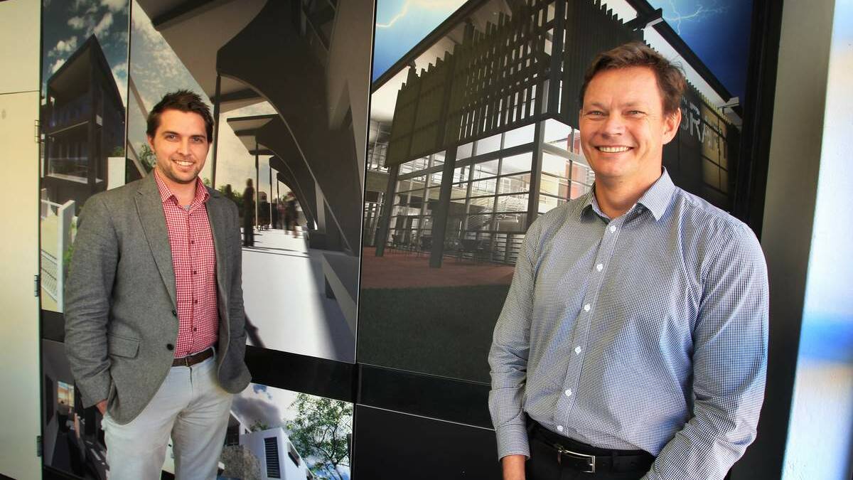 Architects Keiran Brooks, Manager in the firm's new Sydney operations and Jon Webber founder of Webber Architects in the Civic office in Hunter Street. Pic: Phil Hearne
