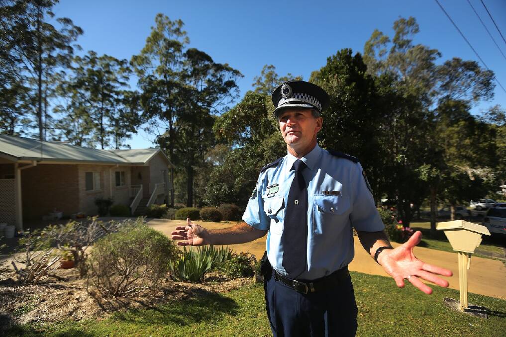 NSW police Super Indendent Paul Fehon in front of the home of 3 year old William Tyrell's grandmother on Benaroon drive in Kendall. William Tyrell was last sighted at the home on Friday, September 12, 2014. 
