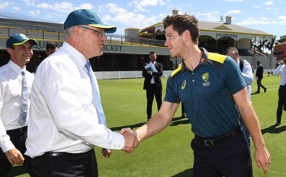 Top jobs: Australian Prime Minister Scott Morrison greets Test captain Tim Paine earlier this year. Picture: AAP