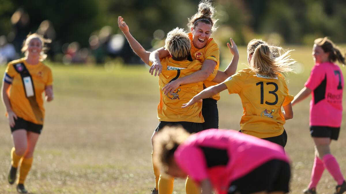 JUBILANT: South Wallsend celebrate a goal in their 2-1 win over Adamstown at Walker Fields on Sunday. Picture: Marina Neil