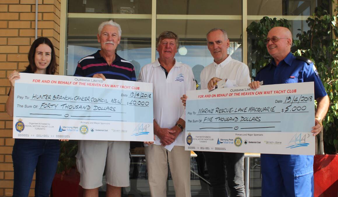 Cancer Council's Lauren Dale, vice-commodore Mel Steiner, state MP Greg Piper and Marine Rescue Lake Macquarie's Mal Wadrop appear alongside sponsors at the Heaven Can Wait Charity Sailing Regatta cheque presentation held at Royal Motor Yacht Club, Toronto. Picture: Isaac McIntyre